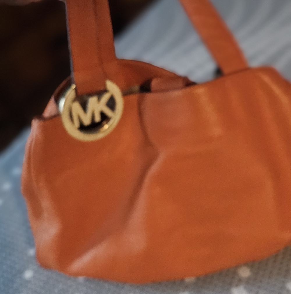 Michael Kors Orange Leather Shoulder Tote with MK Disc Charm